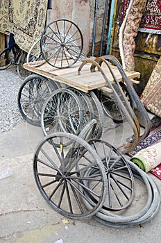 Trishaw wheels in Delhi bazaar, India