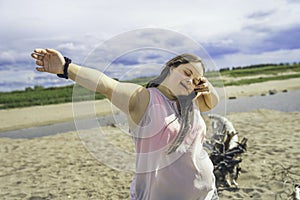 Trisomy 21 woman having fun at the beach