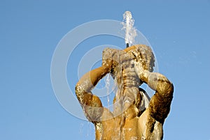The triton fountain in Rome photo