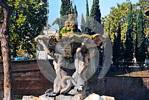 Triton fountain in Rome, Italy photo
