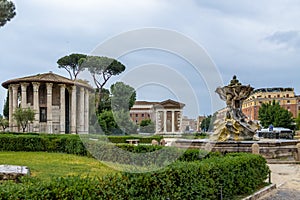 Tritons fountain and Temple of Hercules Victor - Rome, Italy