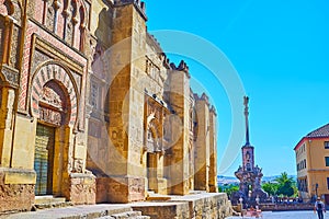 The Triumph of San Rafael monument behind Mezquita rampart, Cordoba, Spain