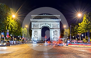 Triumphal arch Arc de Triomphe at night, Paris, France