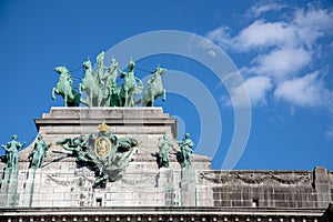 Triumphal Arch statue of a charioteer with four horses placed on a plinth in Brussels, Belgium