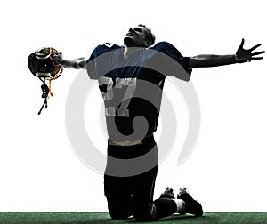 Triumphant american football player man silhouette photo