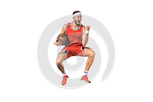 triumphing young basketball player jumping with ball