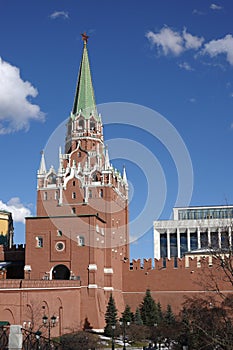 Troitskaya Tower of the Moscow Kremlin and the State Kremlin Palace on spring sunny day