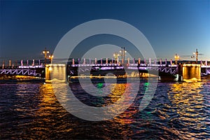 Troitskiy Trinity Bridge over Neva River with night illumination. Saint-Petersburg. Russia