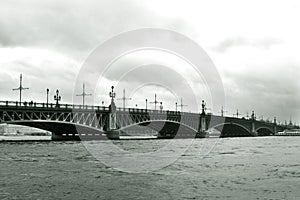Troitsky bridge over the river. Vintage retro photo.
