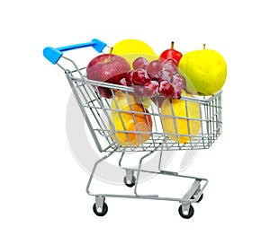 Mini shopping cart filled with fruits isolated on white background