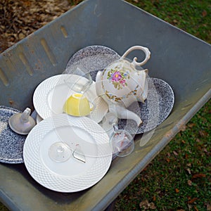 Trolley loaded with discarded tableware