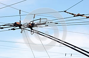 Trolleybus wires against the sky