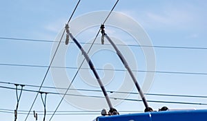 Trolleybus wires against the sky