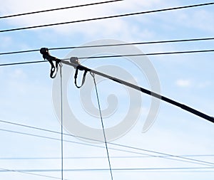 Trolleybus wires against the sky