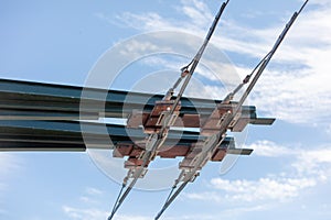 Trolleybus wires against the sky