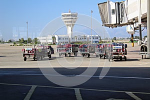 Trolleys with cargo at the international airport of Antalya - July 2017