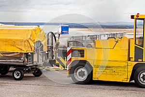 Trolleys loaded with luggage at an airport