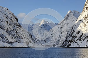 Trollfjord with snow-capped mountains