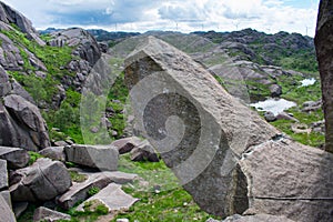 Trollpikken hike in Europe (Norway) with Windmills over rural mountains. reen Future concept