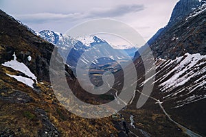 Trolls road in Norway - mountain route of Trollstigen, top view. Spring season.