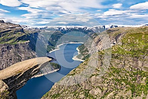 `Trolltunga, Troll`s tongue rock above lake Ringedalsvatnet, Norway`