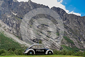 Trollveggen is one of Norway`s most famous mountains with old police car in front