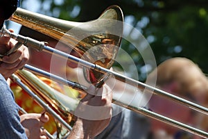 Trombone player entertains the crowd photo