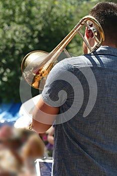 Trombone player entertains the crowd photo