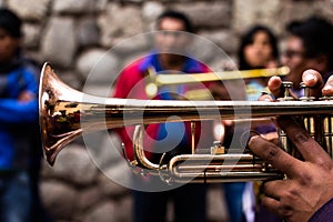 Trombones playing in a big band.
