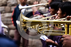 Trombones playing in a big band.