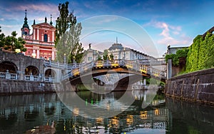 Tromostovje bridge and Ljubljanica river in the city center. Ljubljana, capital of Slovenia. photo