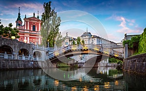 Tromostovje bridge and Ljubljanica river in the city center. Ljubljana, capital of Slovenia. photo