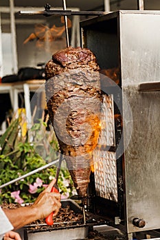 Trompo de carne and Mexican Tacos al Pastor in Mexico city photo