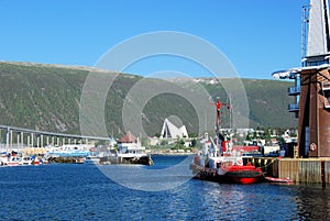 Tromso harbor with views of Tromso bridge, Ishavskatedralen, Norway