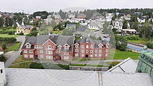 Tromso, Norway. Aerial View of Upper Secondary School and Homes Drone Shot 60fps