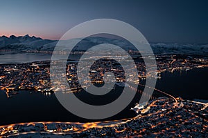 TromsÃ¸ Cityscape Glowing at Night