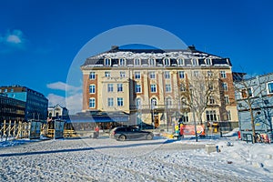 TRONDHEIM, NORWAY - APRIL 06, 2018: Trondheim central square Torvet with the statue of Olav Tryggvason, the founder of