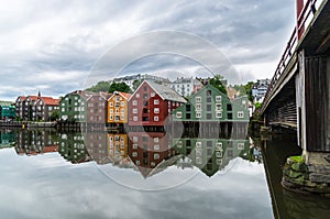Trondheim river front under cloudy sky