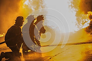 A troop of firefighters attacking