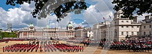 Trooping the Colour, annual military parade in London, UK. Guards wear red and black traditional uniform with bearskin hats.