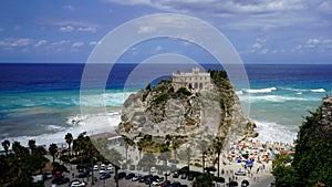 The church a rock and the beach, Tropea, Italy photo