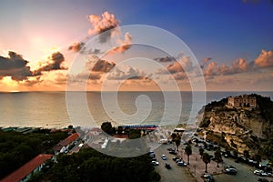 Tropea view, Calabria, Italy. Tropea view of beach and castle at sunset, Calabria, Italy photo