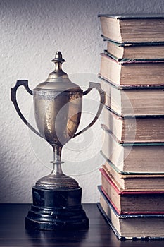 Trophy and book