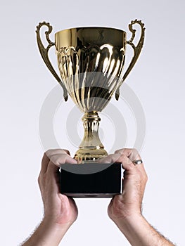 Trophy held above head