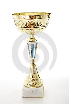 Trophy with white background. Winner award of Champion. Gold trophy victory succes prize.