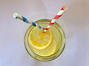 Tropic bar lemonade in jar with straws