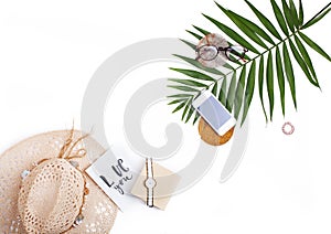 Tropic palm leaf, straw hat, glasses and handwritten card `love