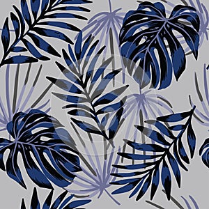 Tropical abstract leaves pattern on gray background