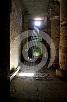 Sun rays entering the temple of citi in sohag through a small top window	 photo
