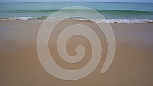 Tropical andaman seascape scenic off karon beach phuket thailand with wave crashing on sandy shore Beautiful sea in phuket in summ